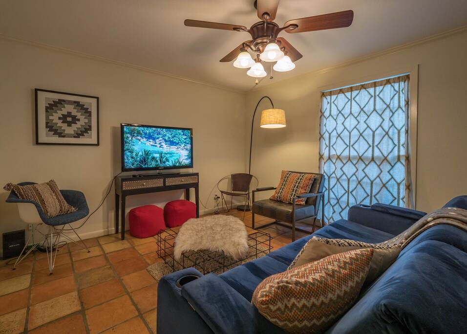 Living Room with Smart TV, Pullout Sofa, and Plenty of Seating