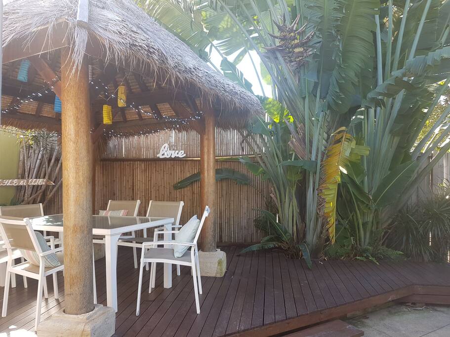 outdoor bali hut with fairy lights