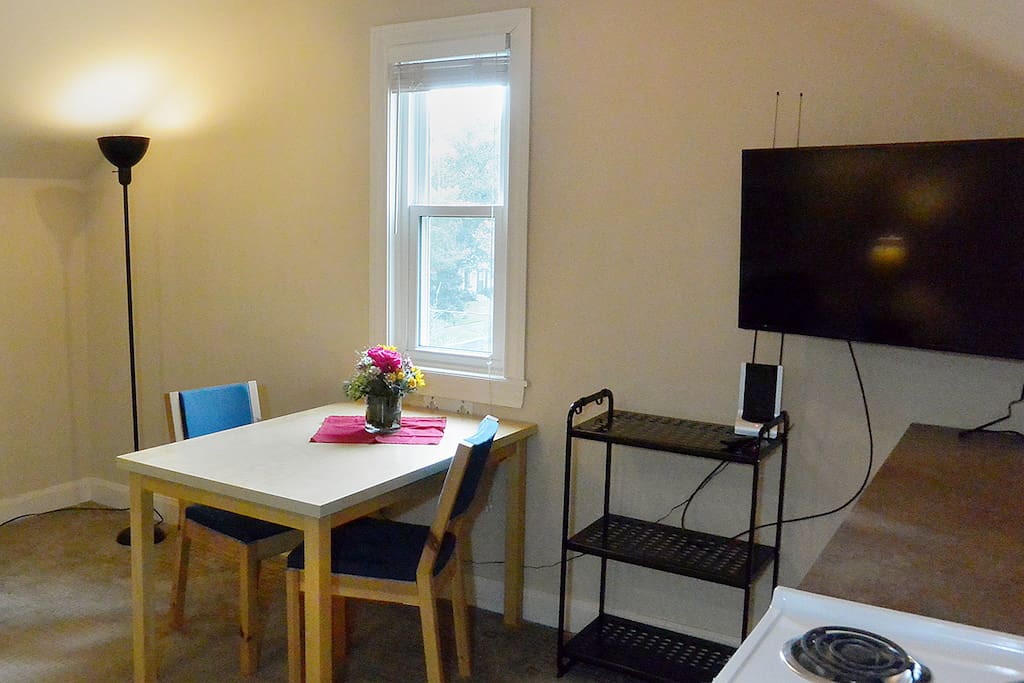Kitchen & work table w/large TV