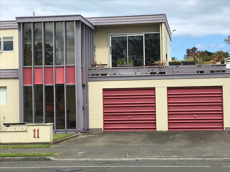 Parking available in front of left garage door.