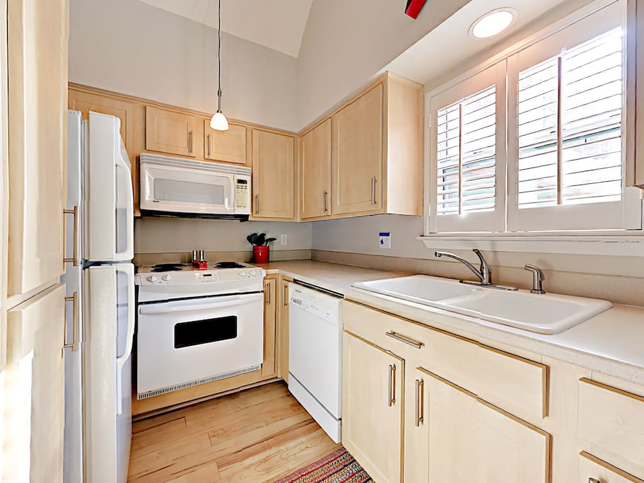 Full kitchen with double sink and dishwasher