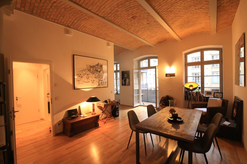 Living Room with kitchen niche & access to balcony