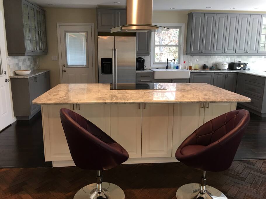 A dream kitchen with marble countertops