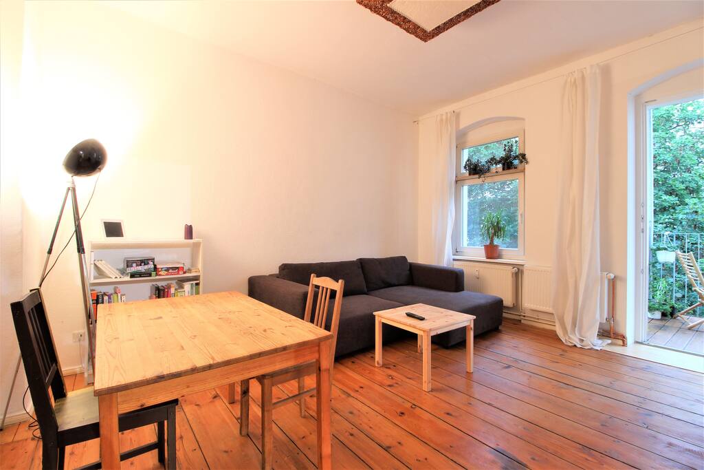 The wooden table can be easily used as a working desk, too.