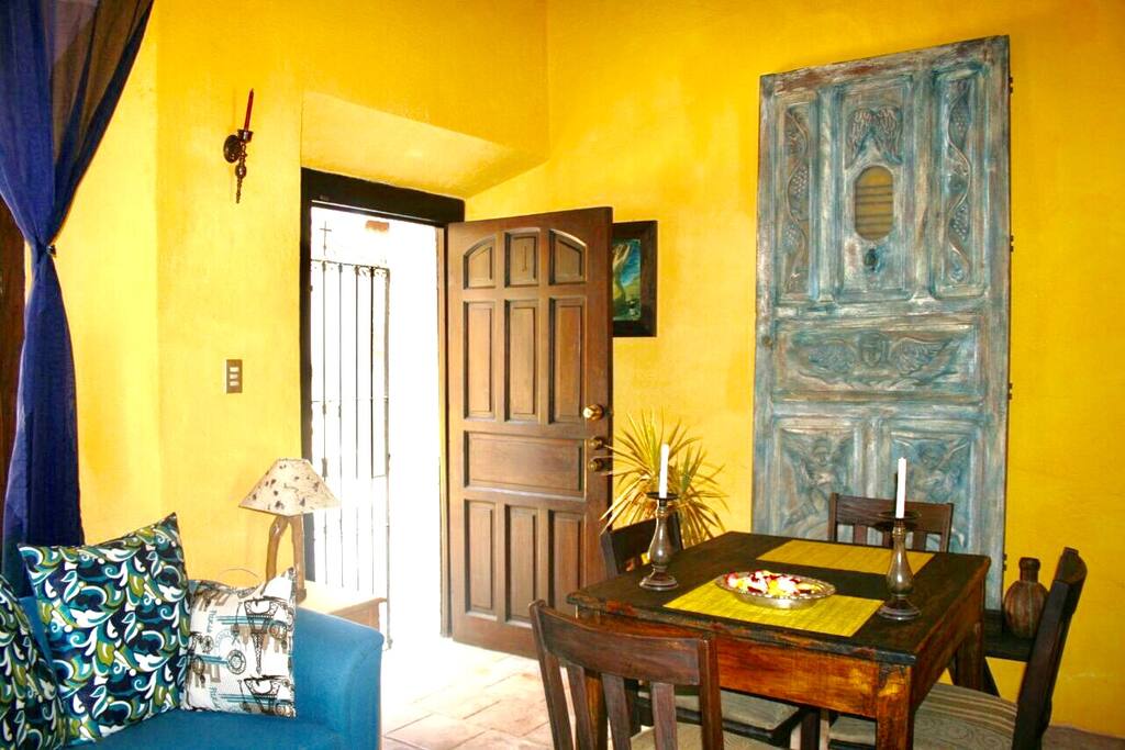 Hand craft 150 years old door attached to the wall is one of the many history features you will find at this home...