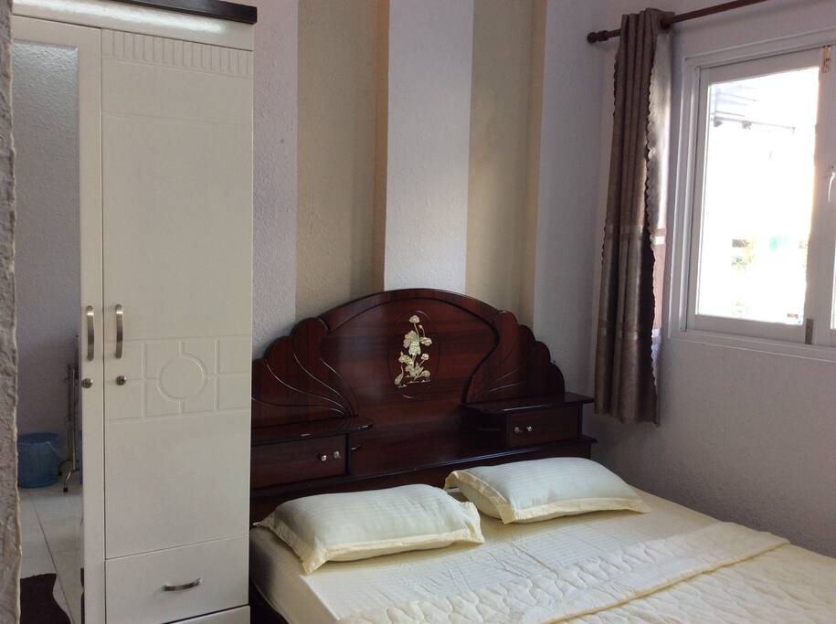 Room 202 - Location 4 (w/ Private bathroom and small balcony) - this location is in a local day-market alley