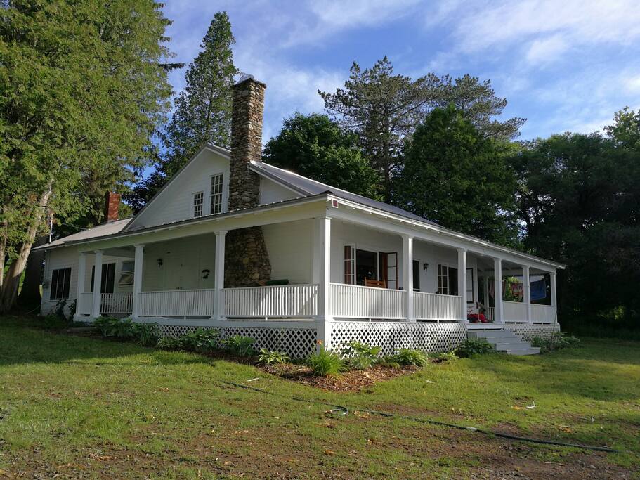 Silverlaken Lodge: View from the south. Wrap around deck faces the lake.
