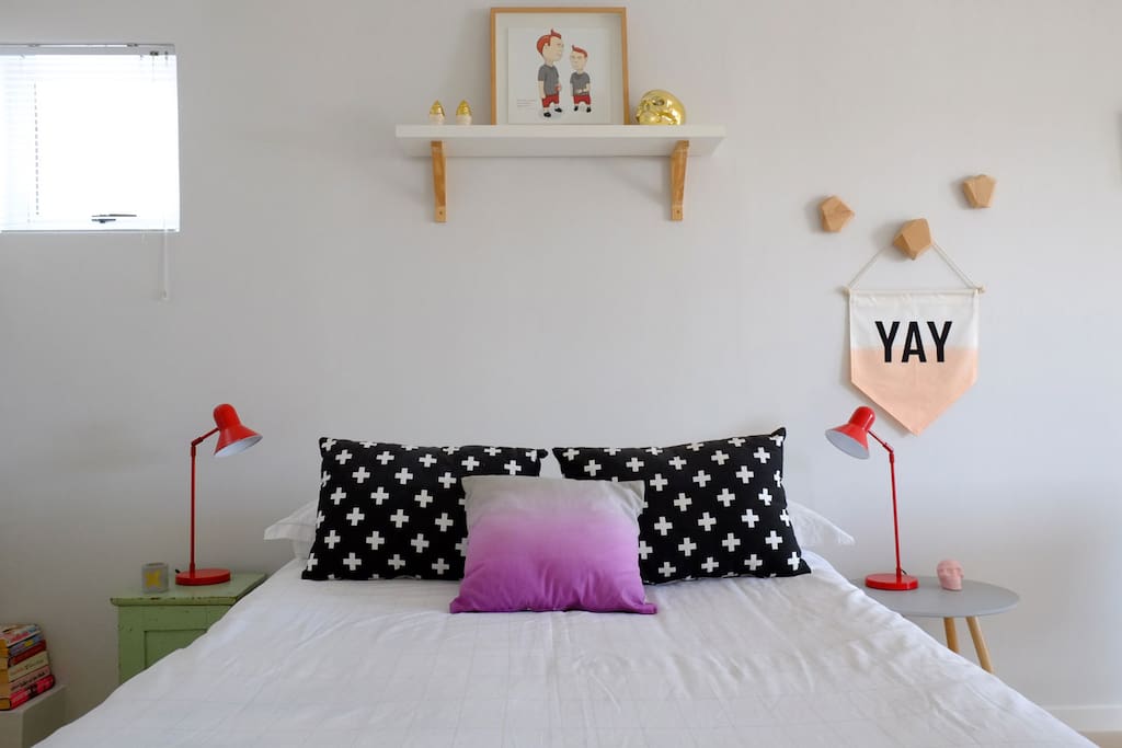 Comfy double bed and side tables