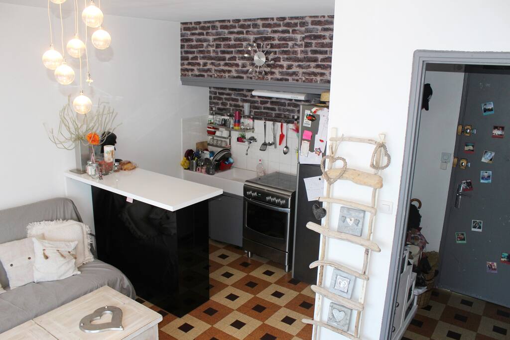 Open kitchen with oven and microwave oven