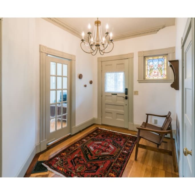 Beautiful, original stained glass window in welcoming foyer
