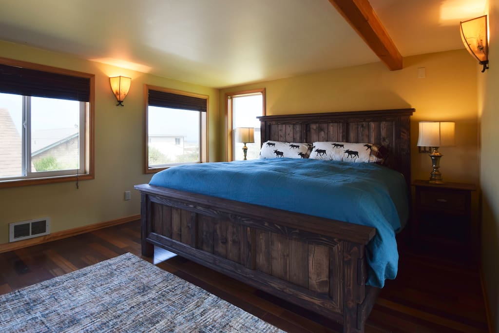Master bedroom with a king size bed