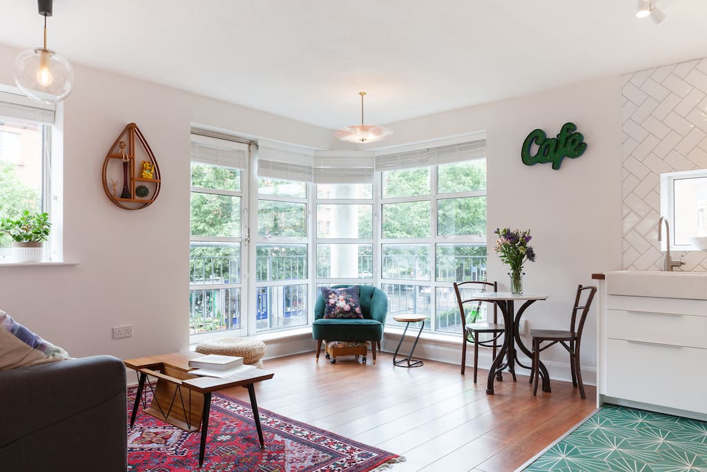 Open-plan living room and kitchen overlooking Patrick's Cathedral