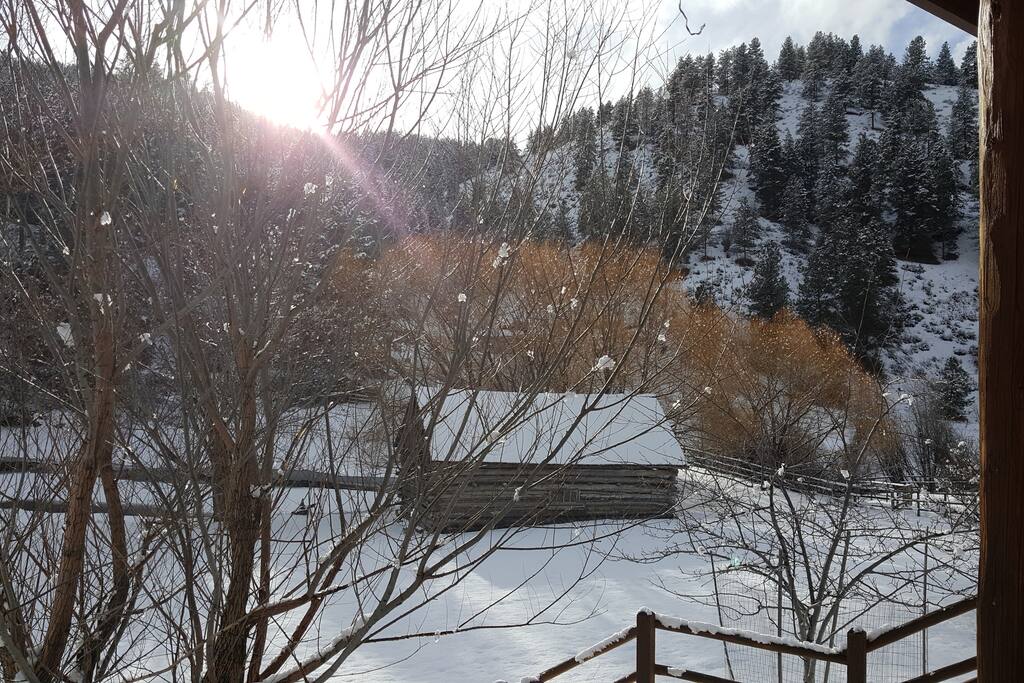 Winter view of old barn and frozen lake from the apartment deck looking West.