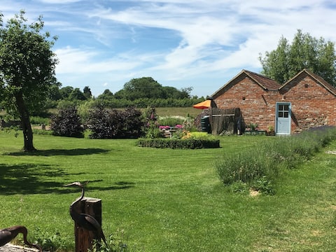 Quirky Cowshed at Park Mill Farm in The Cotswolds