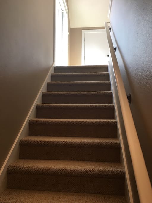 Stairs to the apartment from the private entrance