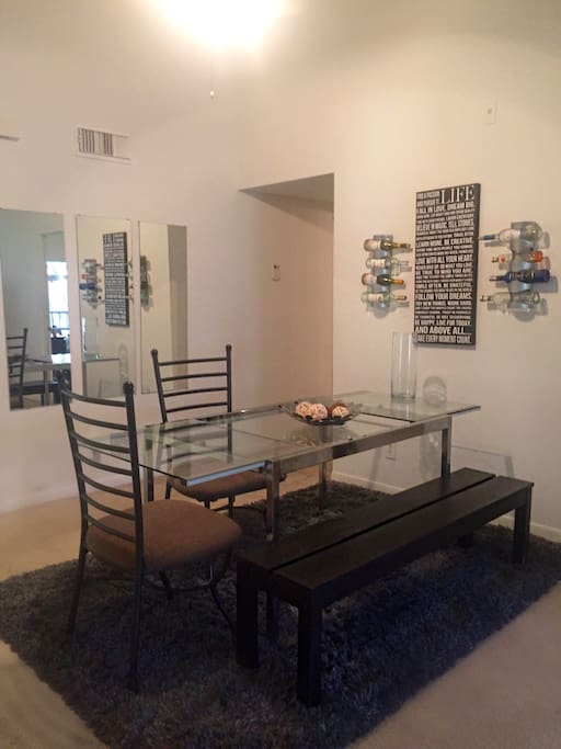 Modern Dining Area with High Ceilings!