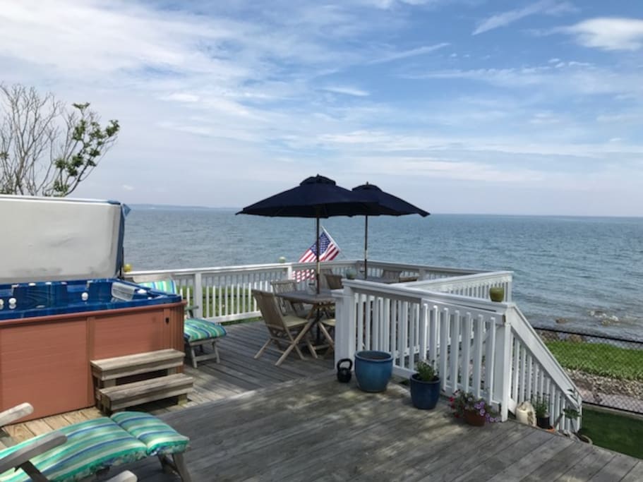 Perfect Views on the Outdoor Deck with Teak tables and chairs and umbrellas