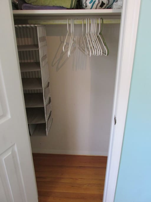 This is the closest which includes hangers and a hanging organizer.