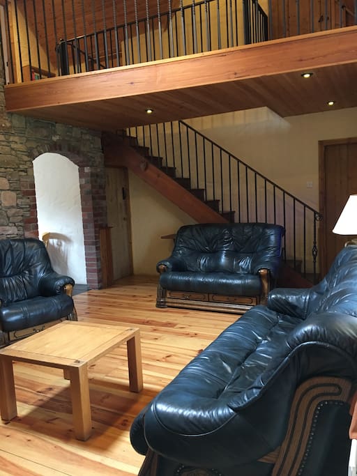 Living room with vaulted ceiling