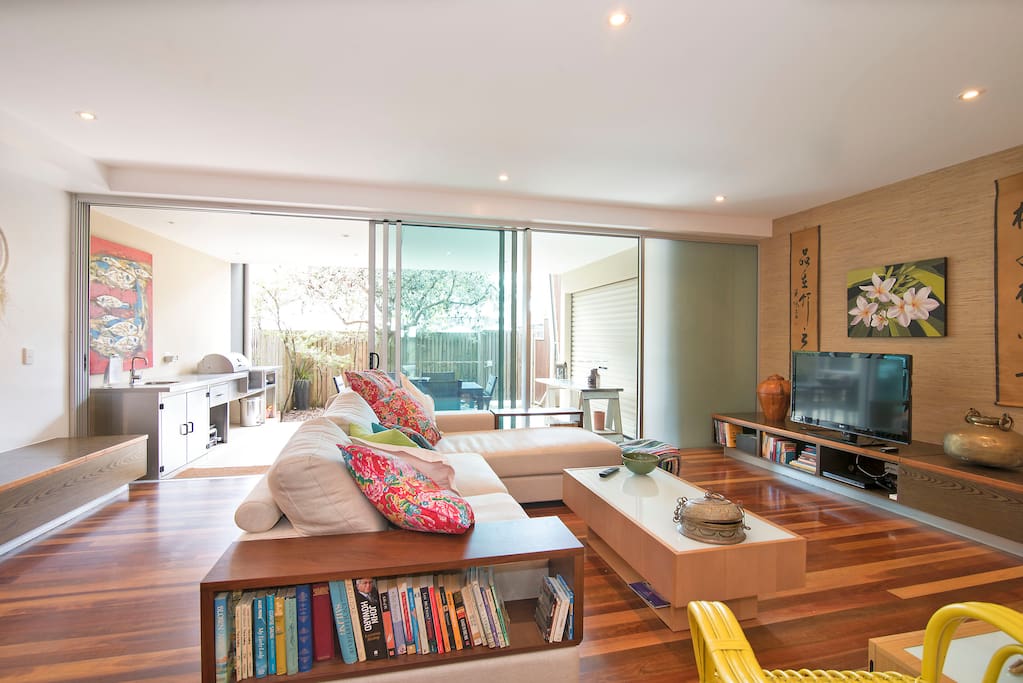 Sliding doors slide right back to make inside/outside one room