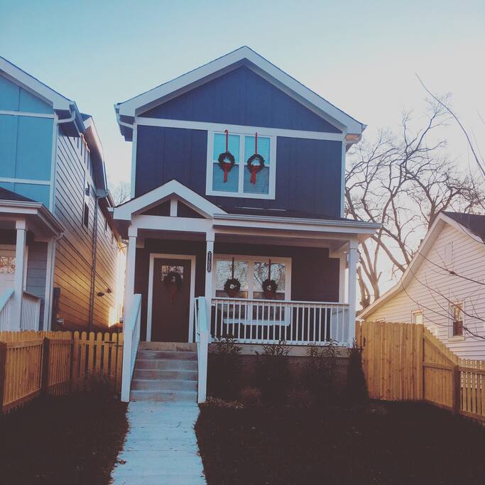 Front of home decorated for holidays. When the weather is nice it’s the perfect place to sit and have morning coffee.