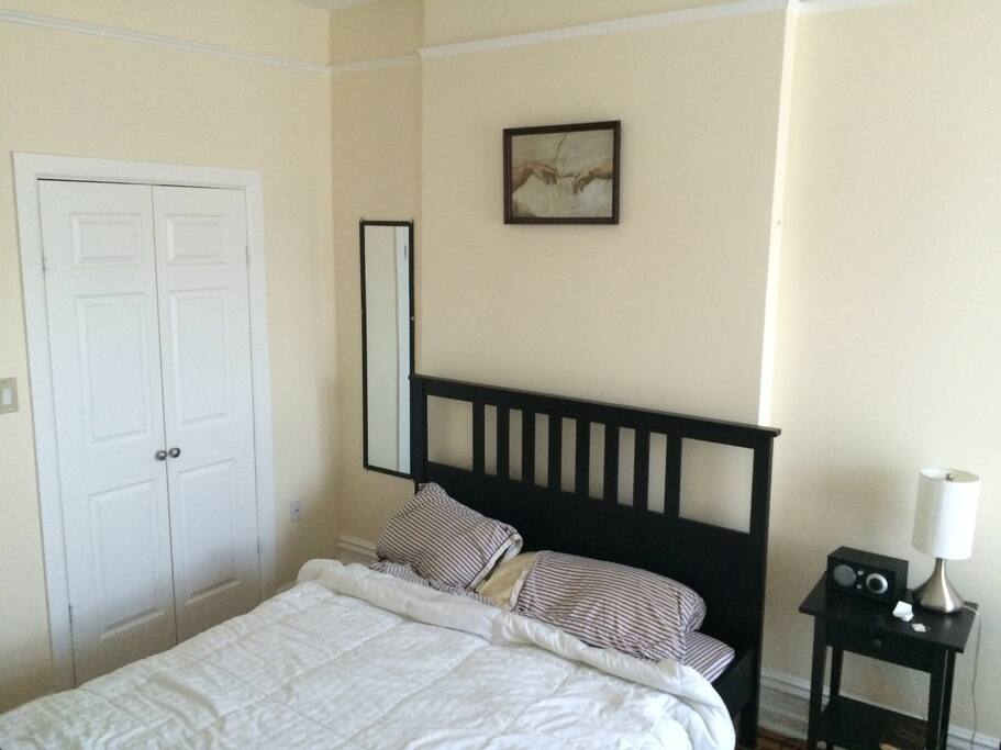 250 square foot private room with office space and ceiling fan