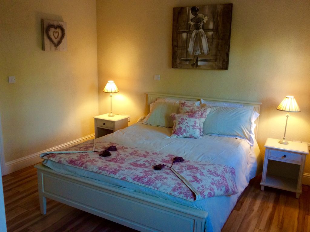 King Size bed downstairs.