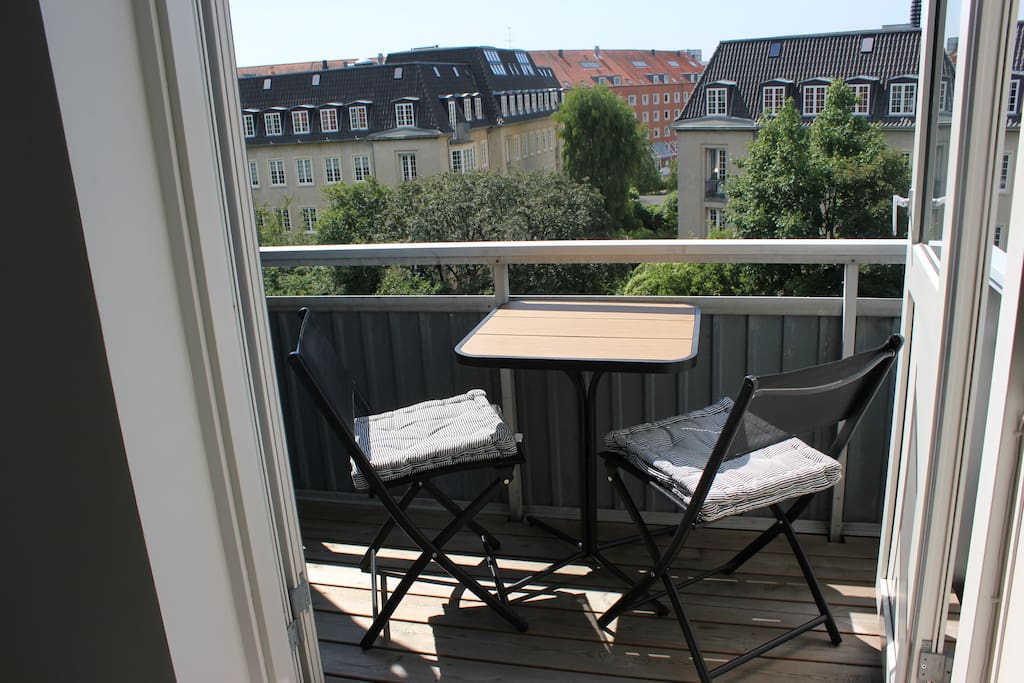 Balcony with sun in the afternoon and in the evening. Is featured with a WEBER gas grill