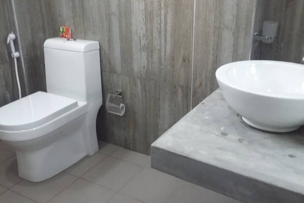 Spring modern bathroom with hot water for shower.