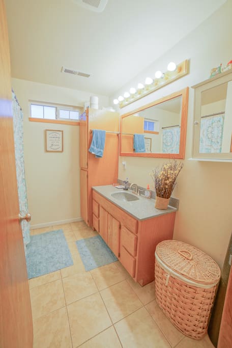 Clean, simple bathroom with tub and shower