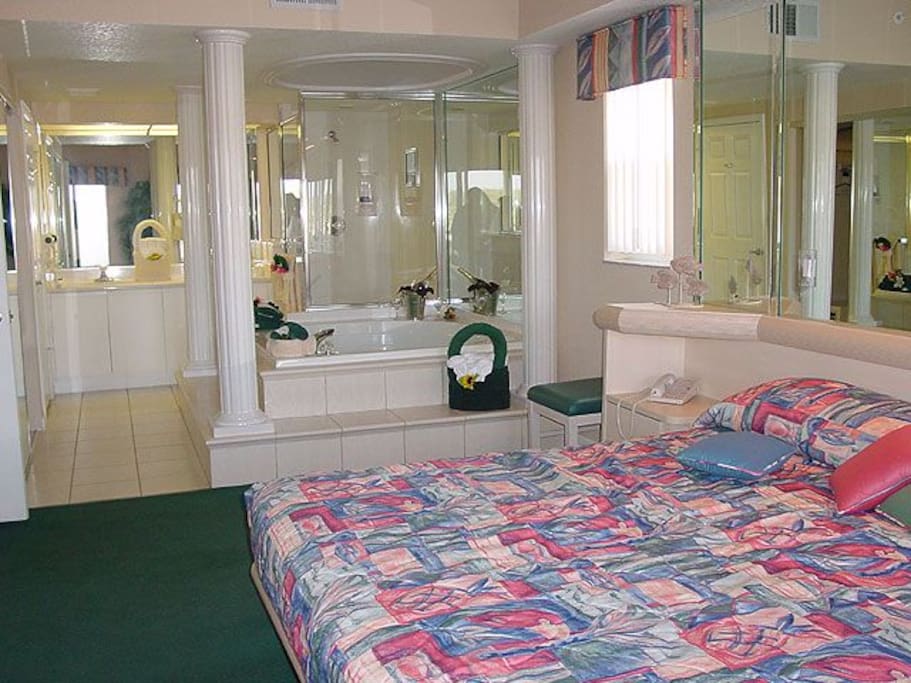 Master bedroom and whirlpool tub (including full bath) in larger unit.