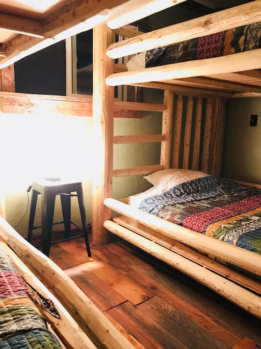 Yes, those are FULL SIZE bunk bed sets! This bedroom is a communal space so make a plan to like each other enough to sleep 4+ people in here!