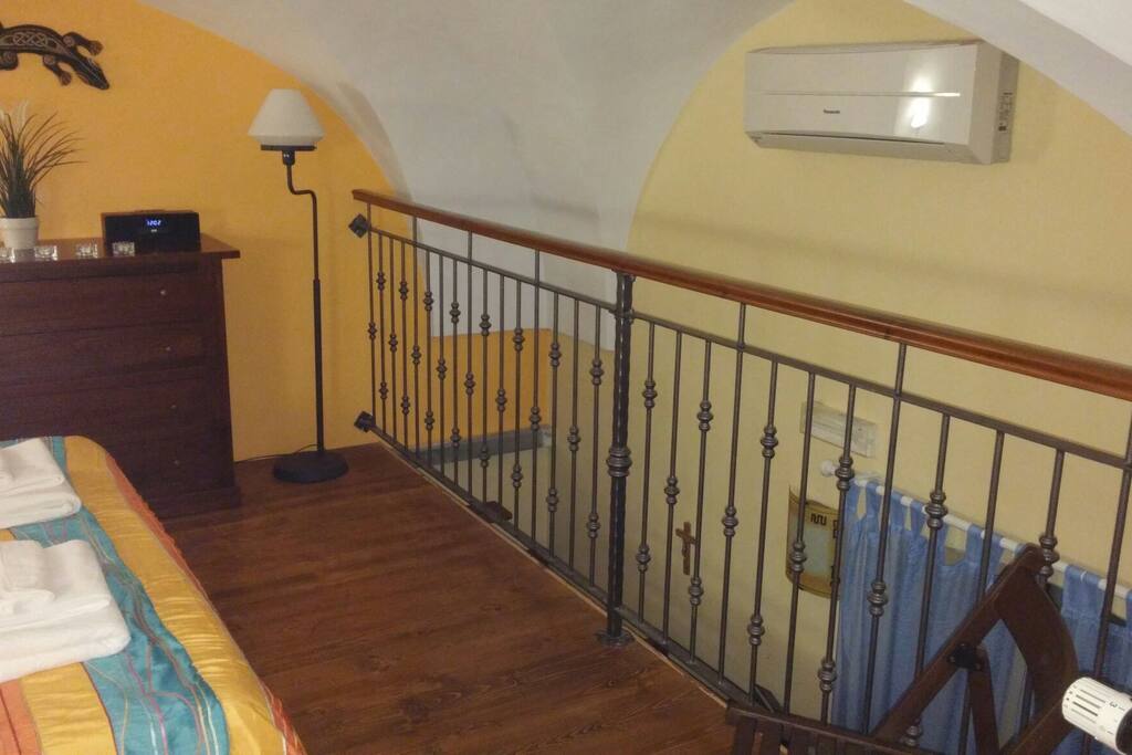 Wooden loft with double bed