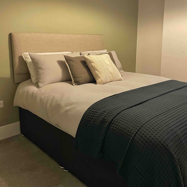 Bedroom two, with spacious fitted wardrobes, John Lewis pillows and bedding