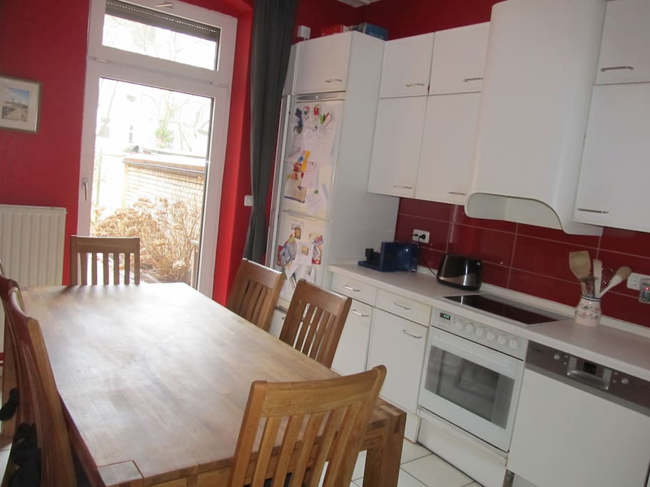 Fully-equipped kitchen with direct access to your own garden and terrace