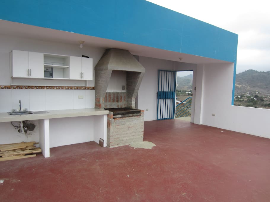 Terraza comunitaria y asador