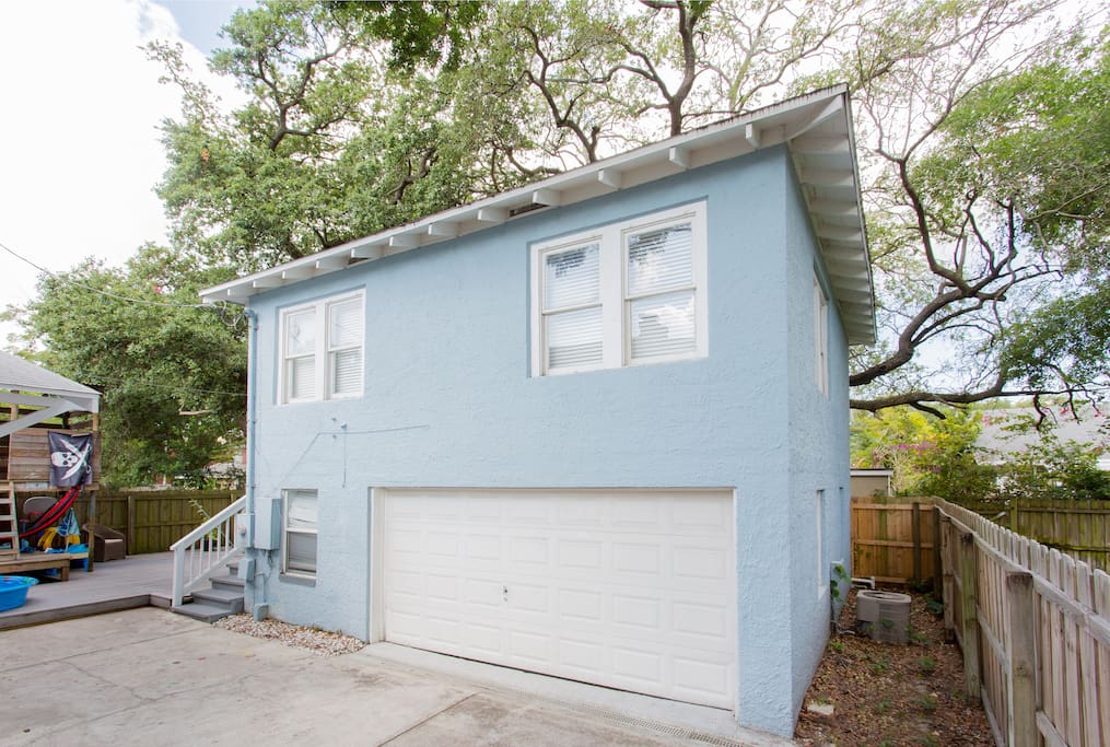 Detached garage for a private stay in a great neighborhood. (Now painted grey)