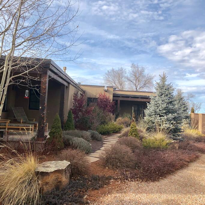 Front of main house, driveway, landscape
