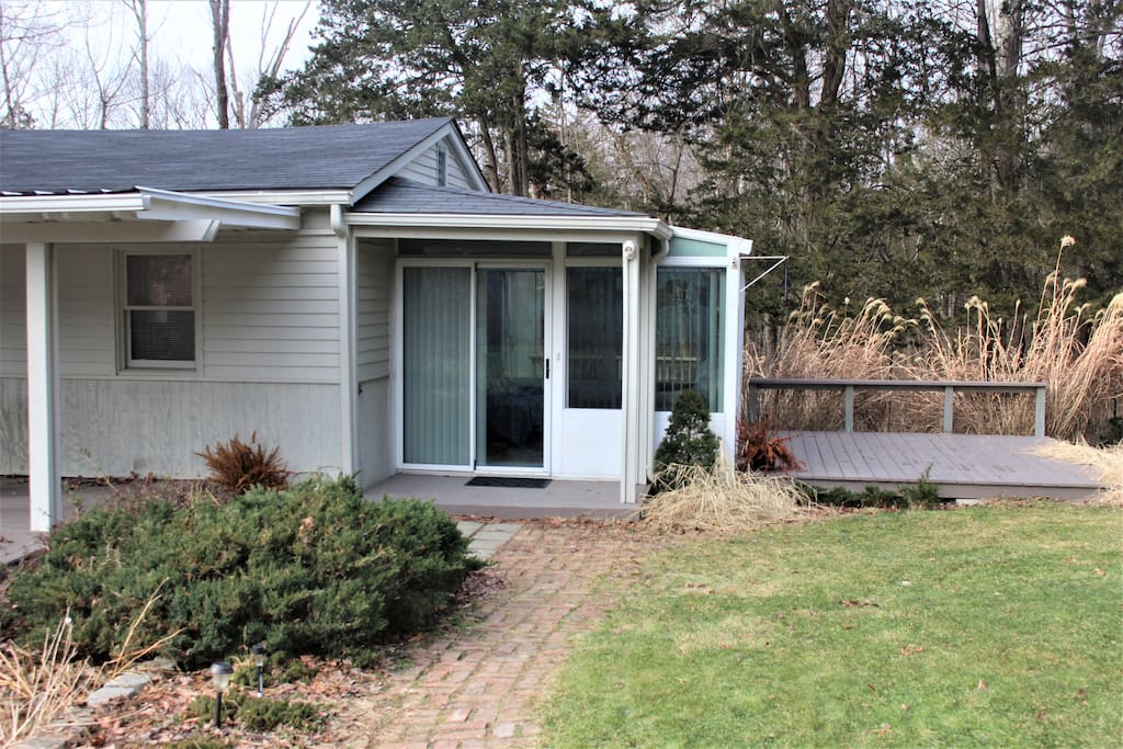 Nice one bedroom cottage with great sunroom and lots of outdoor space