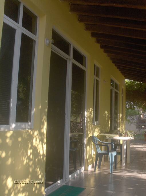 Porch with entrance to private room.