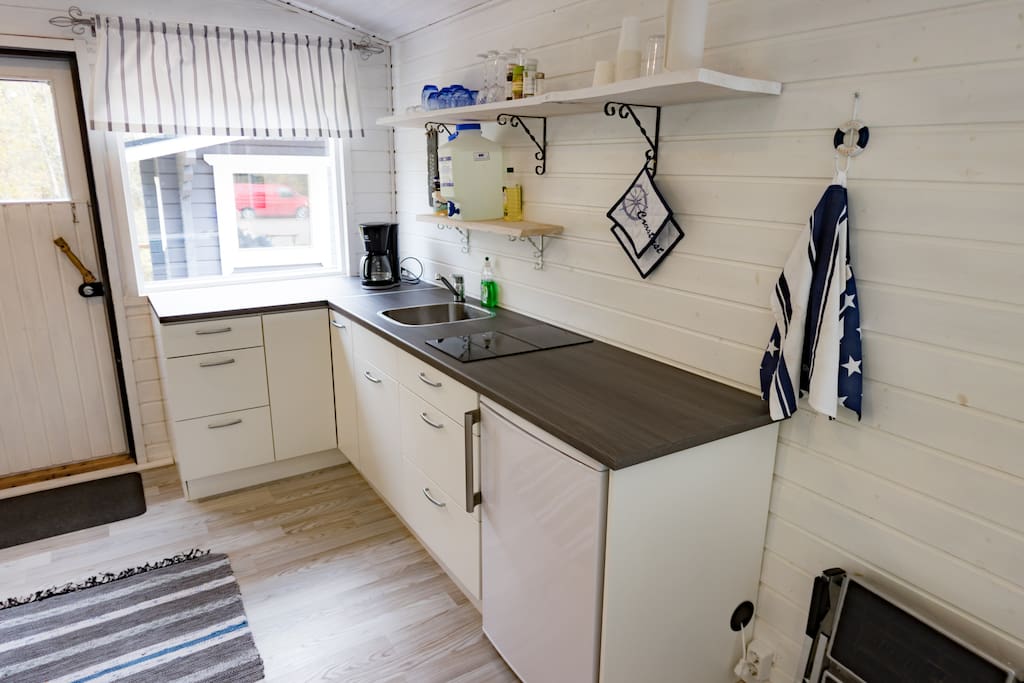 Kitchen include refrigerator and stove