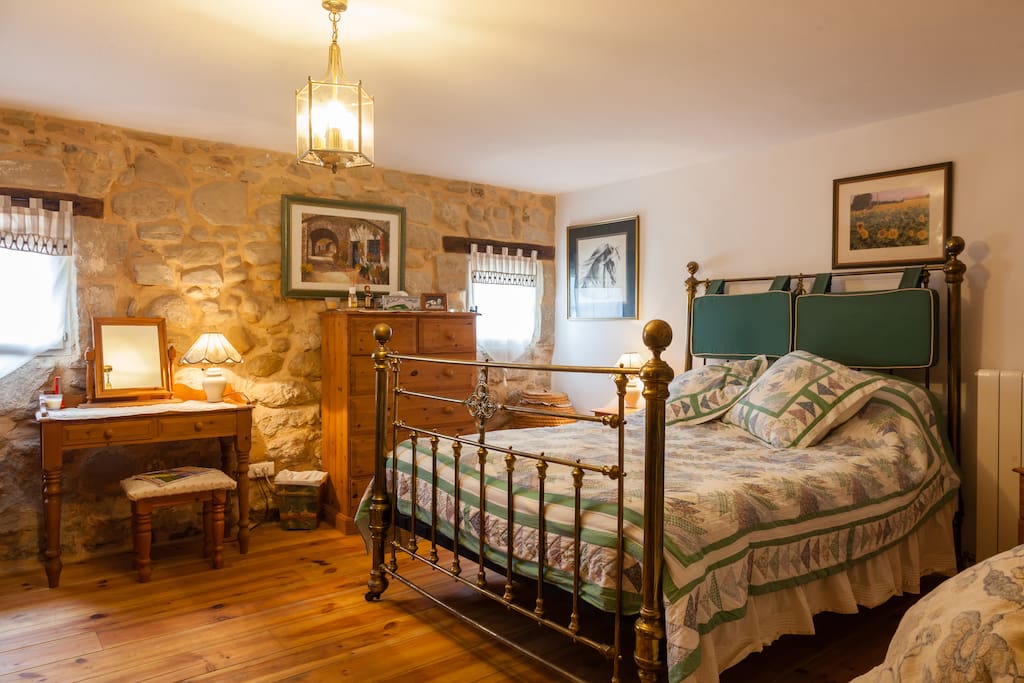Double bedroom with wardrobe and chest of drawers and central heating