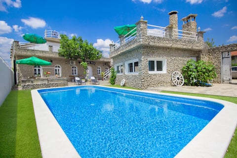Ship made of thousands tiny rocks (heated pool)