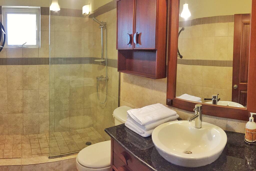 Bathroom with full pressure warm and cold shower.