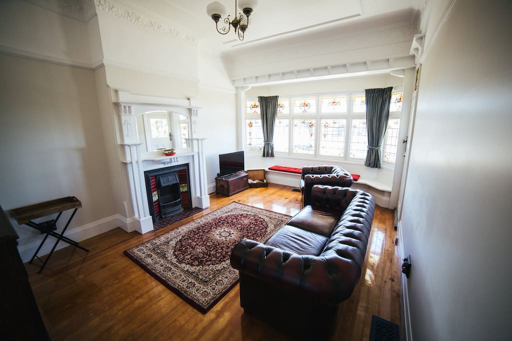 Relax on the Chesterfield sofa.