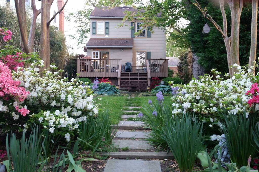 Back entrance in the spring. Libo said, "We miss the beautiful flowers around her house already."