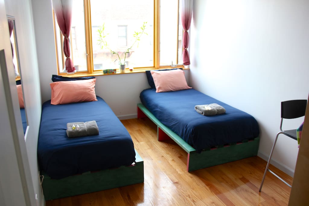 lots of light in your room with 2 single beds convertible into a 1 king bed