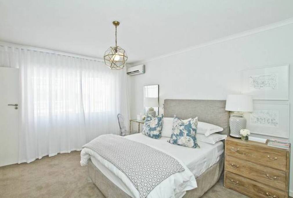 The bedroom with built in cupboards