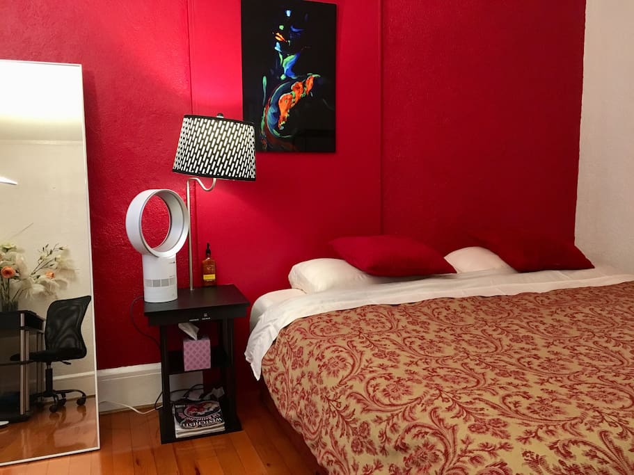 Bedroom with King size bed, powerful & quiet Dyson fan, bedside table with usb charger, and free WiFi