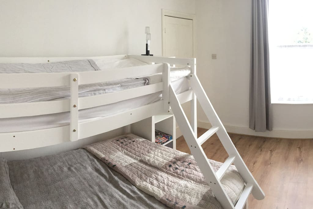 A double bed for the lower bunk and a single upper bunk.